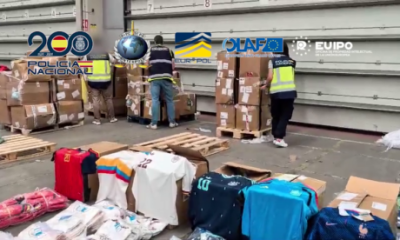 watch:-police-seize-16-tonnes-of-fake-world-cup-football-shirts-bound-for-tourist-hotspots-in-malaga,-madrid-and-barcelona