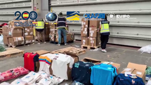 watch:-police-seize-16-tonnes-of-fake-world-cup-football-shirts-bound-for-tourist-hotspots-in-malaga,-madrid-and-barcelona
