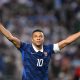 france-shines-with-a-mbappe-brace-in-a-rain‑soaked-match