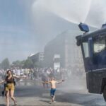 berlin-police-deploy-water-cannons-to-cool-residents-off