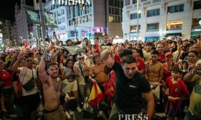 thousands-swarm-madrid-and-barcelona-to-celebrate-spain’s-world-cup-win-as-national-team-flies-home-for-victory-parade