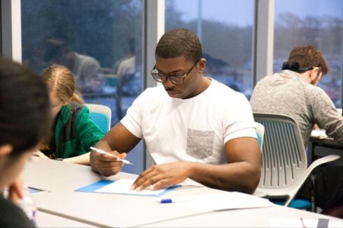 A student writing an essay