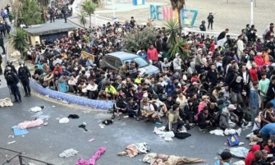 watch:-police-charge-at-migrants-in-ceuta-as-hundreds-stampede-through-streets-towards-new-temporary-shelter