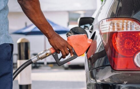 A man filling up his car with petrol