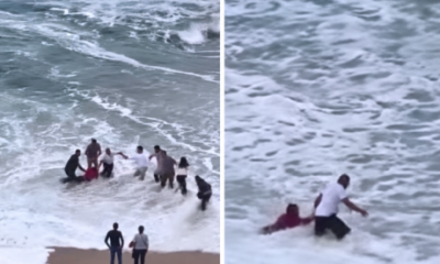 watch:-remarkable-moment-strangers-form-human-chain-to-rescue-woman-swept-out-to-sea-on-beach-in-northern-spain