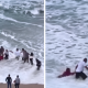 watch:-remarkable-moment-strangers-form-human-chain-to-rescue-woman-swept-out-to-sea-on-beach-in-northern-spain