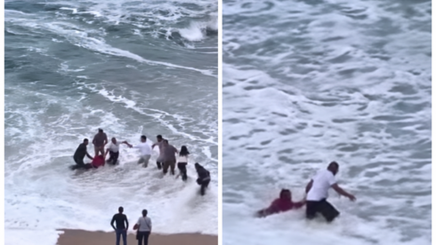 watch:-remarkable-moment-strangers-form-human-chain-to-rescue-woman-swept-out-to-sea-on-beach-in-northern-spain